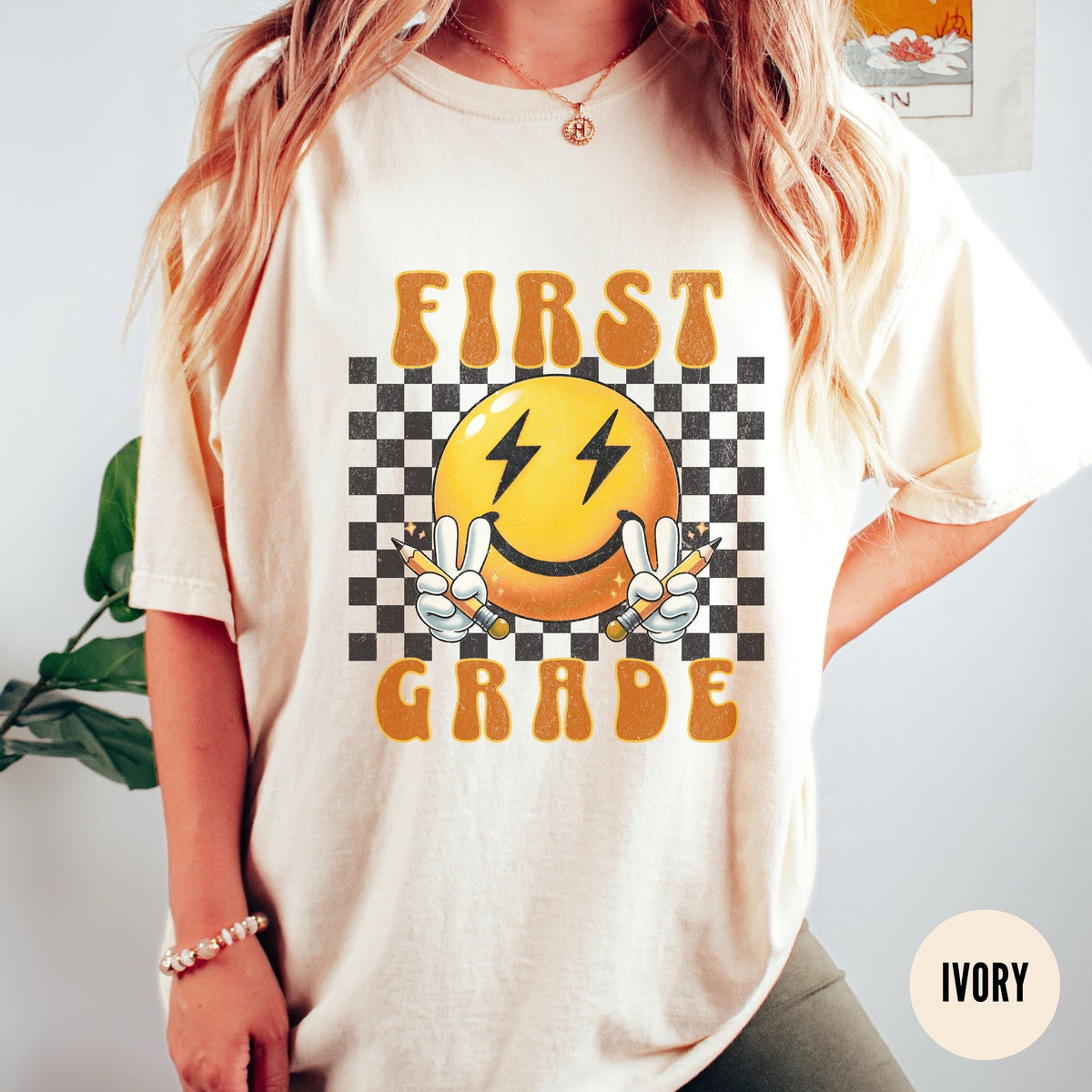 First Grade Teacher ShirtRetro Checkered Teach 1st Grade Teacher Shirt Elementary SchoolTeacher Team ShirtBack to School Graphic Tee – Bold Style · Great Gift For Fans
