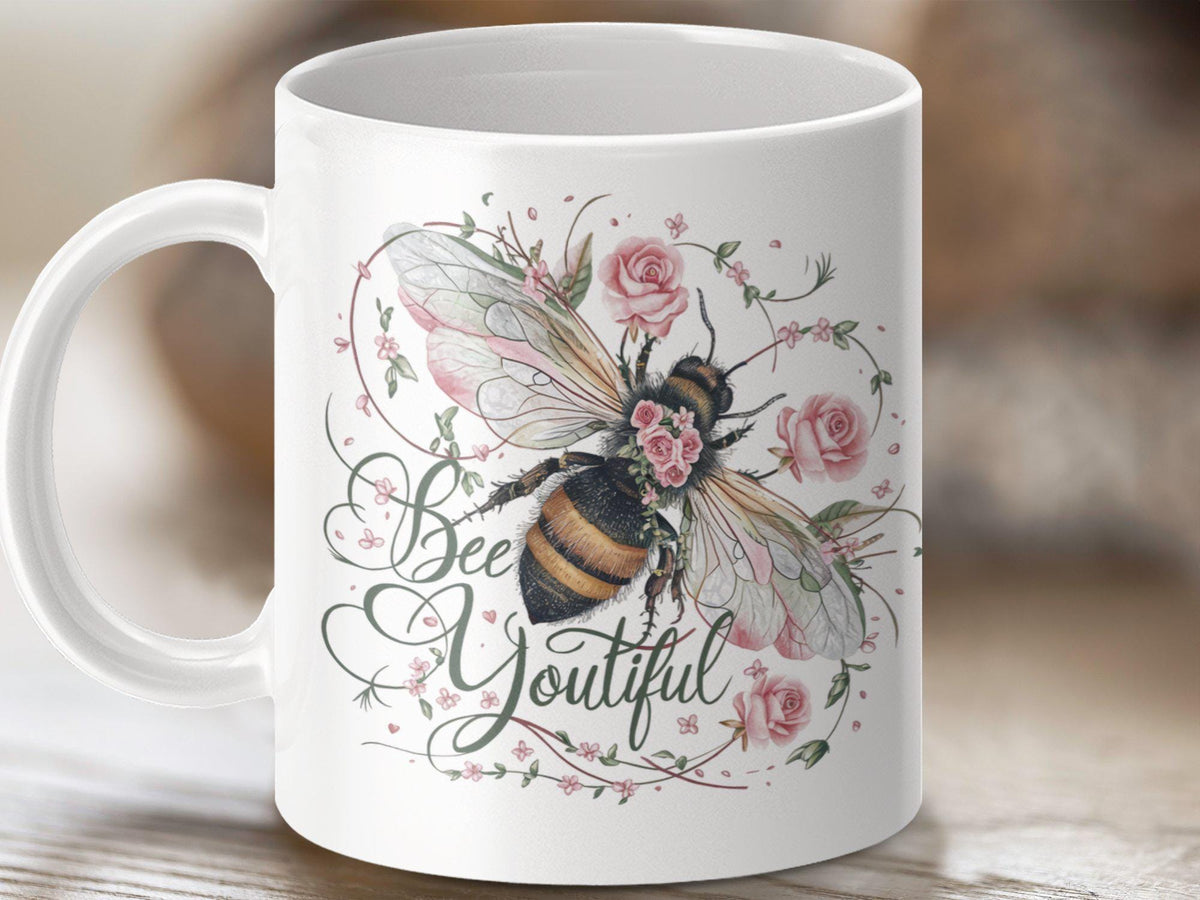 Bee YouTiful Coffee Mug Funny Bee Design Bee Tea Mug Bee Gift Idea Cute Bee Mug with Flowers Bee Lover Gift Adorable Bee Mug Graphic Tee – Soft Feel · Trending Graphic Apparel