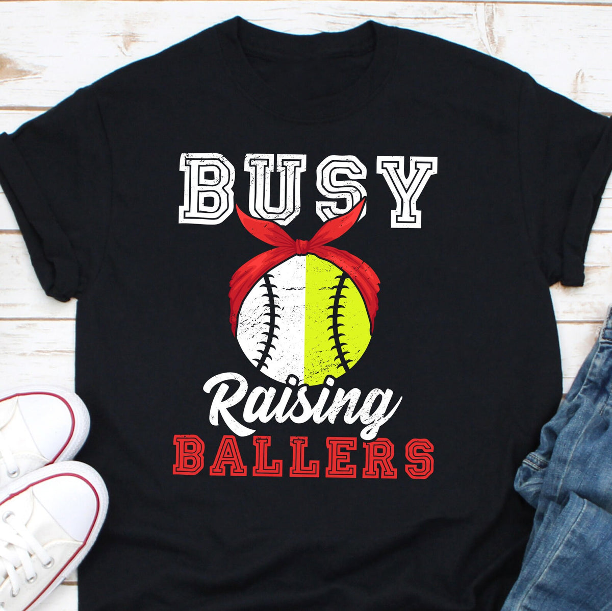 Busy Raising Ballers Shirt Baseball Mama Shirt Trendy Baseball Shirt Baseball Mom Shirt Sports Mom Shirt Mothers Day Gift Baller Mom Graphic Tee – Fan Favorite · Top Pick For Any Outfit