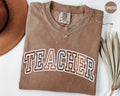 Fall Teacher Shirt College Varsity Teacher Shirt Gift For Teacher Back to School ShirtTrendy Teacher TShirtRetro Teach Graphic Tee – Easygoing Wear · Top Pick For Any Outfit