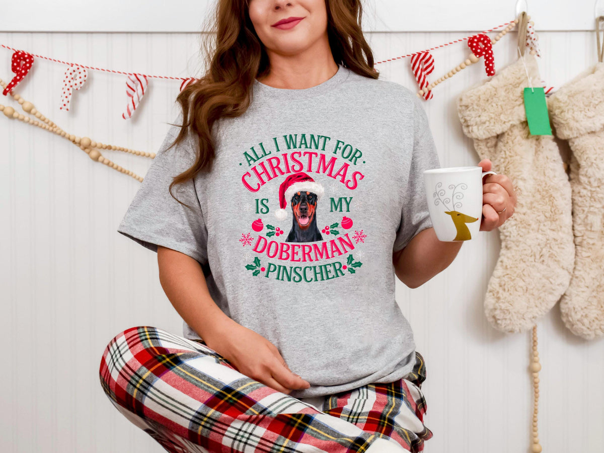 Xmas TShirt for Dog Lovers Xmas Tee Christmas Shirt All I Want for Christmas is My Doberman Pinscher Xmas TShirt Graphic Tee – Bold Style · Trending Graphic Apparel