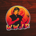 WWJD Johnny Lawrence Cobra Kai Sticker Karate Kid 80s sticker Vintage Movie Sticker TV Shows Sticker Gifts Cobra Kai Characters Graphic Tee – Premium Graphic · Great Gift For Fans