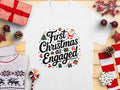 First Christmas as Engaged TShirt Cute Christmas Engagement Shirt Christmas Gift for Engaged Couple Holiday Tee Festive Shirt Graphic Tee – Fan Favorite · High-Quality Print