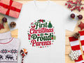 First Christmas as Proud Parents TShirt Cute Holiday Gift Festive Christmas Tee Family Holiday Shirt New Parents Christmas Top Graphic Tee – Premium Graphic · Must-Have Style