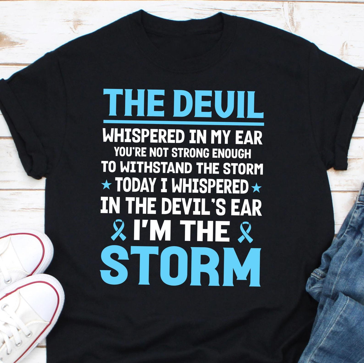 They Whispered In My Ear You Can39t Withstand The Storm Child Abuse Shirt Abuse Awareness Shirt Prostate Cancer Shirt Blue Ribbon Tee Graphic Tee – Fan Favorite · High-Quality Print