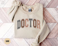 Doctor Sweatshirt New Doctor Sweater Future Doctor Gift PHD Doctorate Shirt Medical Student Gift Women in Medicine Crewneck Sweatshirt – Feel-Good Design · Perfect For Daily Wear