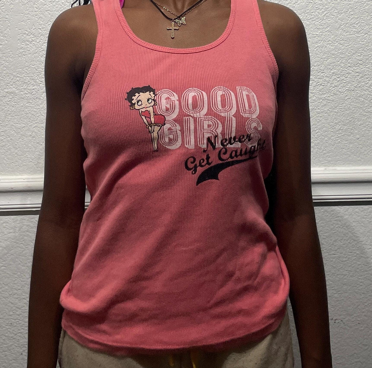 Vintage 2000s Betty Boop Never Get Caught pink Tanktop modeled size S Tank Top – Aesthetic Look · Trending Graphic Apparel