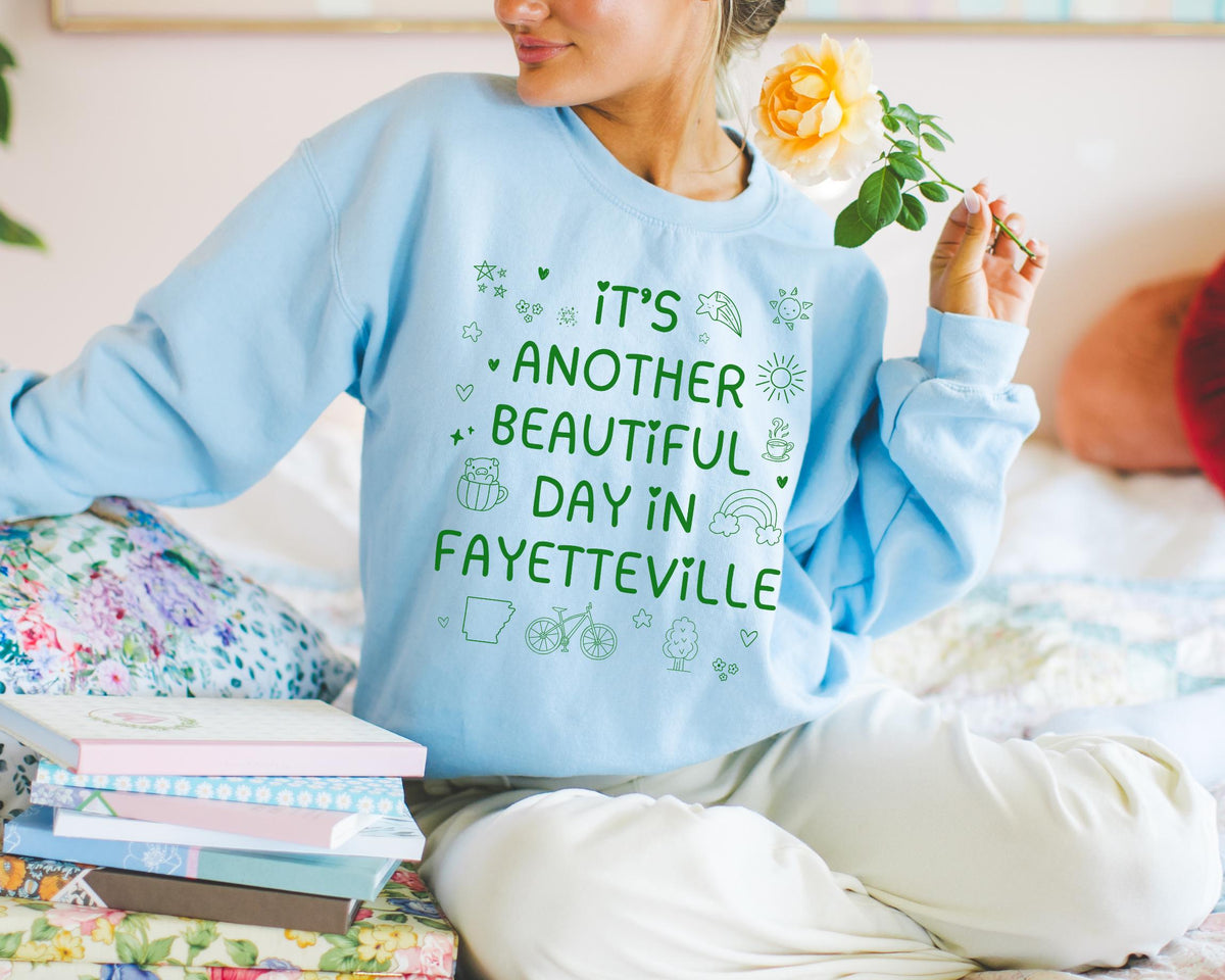 Fayetteville Arkansas Doodle Sweatshirt with Adorable Y2K Aesthetic Another Beautiful Day in Fayetteville Cute Arkansas Lover Crewneck Sweatshirt – Easygoing Wear · Trending Graphic Apparel