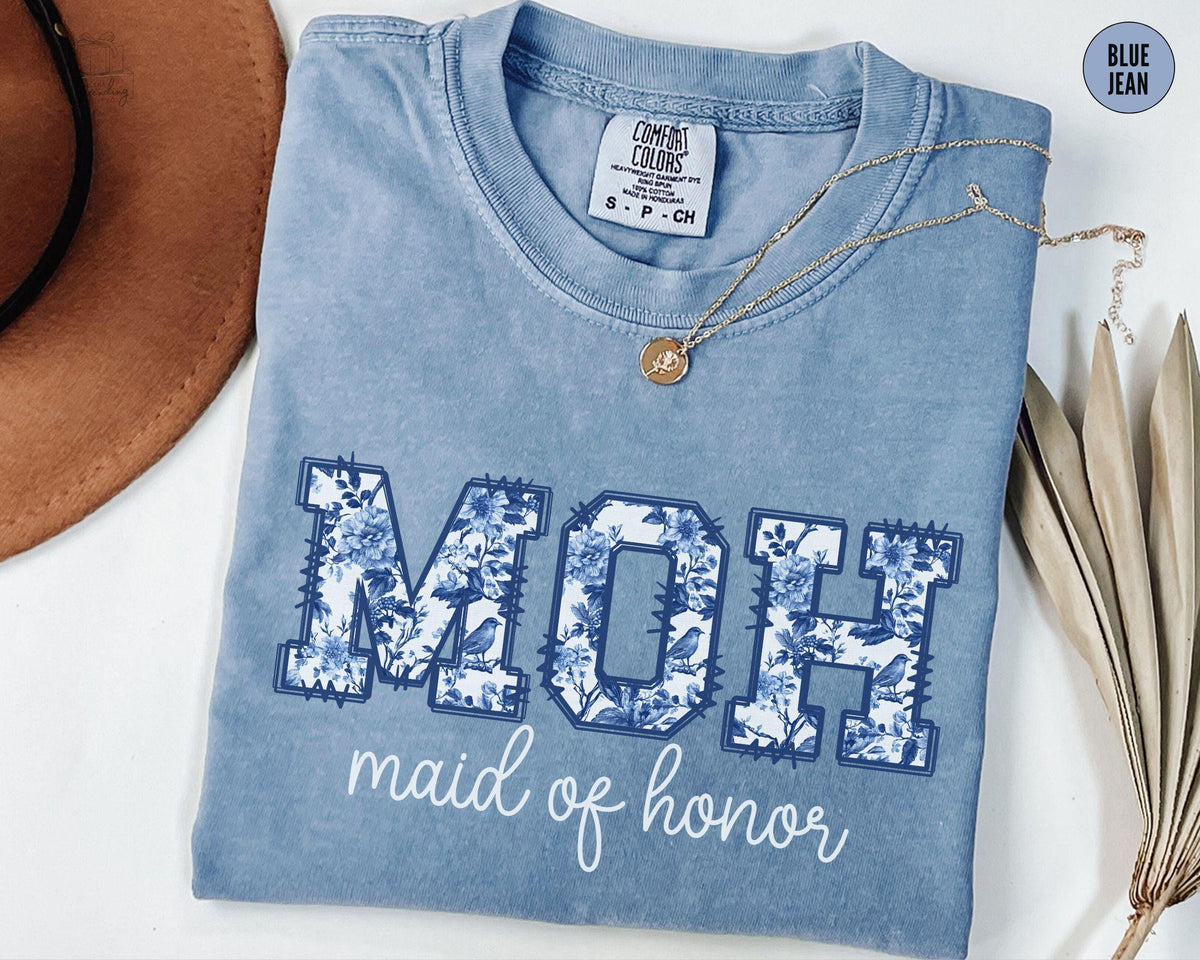 Maid of Honor Shirt MOH Proposal Tshirt Coquette Bridal Getting Ready Outfit Luxury Bachelorette TeeMatron Of Honor Gift Graphic Tee – Cozy Vibes · Must-Have Style