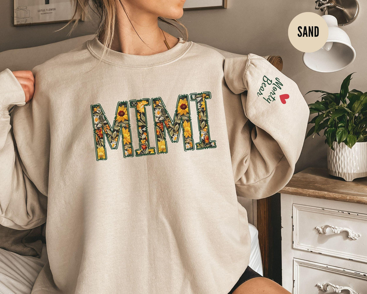 Custom Sunflower Mimi SweatshirtFloral Mimi GiftsPersonalized Mimi Crewneck with Kids Names on SleeveBest Grandma CrewneckGranny Sweater Sweatshirt – Aesthetic Look · Trending Graphic Apparel