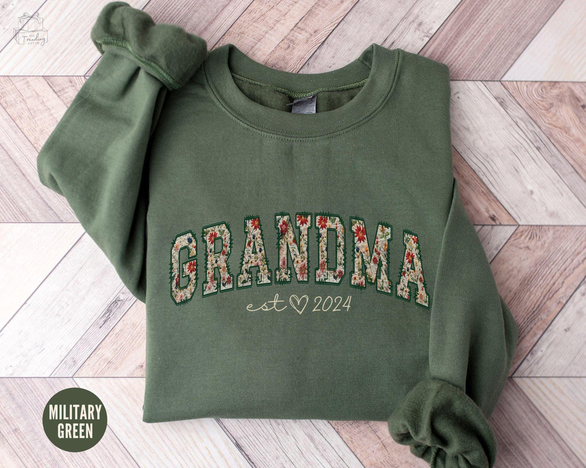 Personalized Grandma Christmas Sweatshirt Floral Grandma Heart Sweater Custom Grandma Est Gift Wildflower Nana Crewneck Mothers Day Gift Sweatshirt – Bold Style · Great Gift For Fans