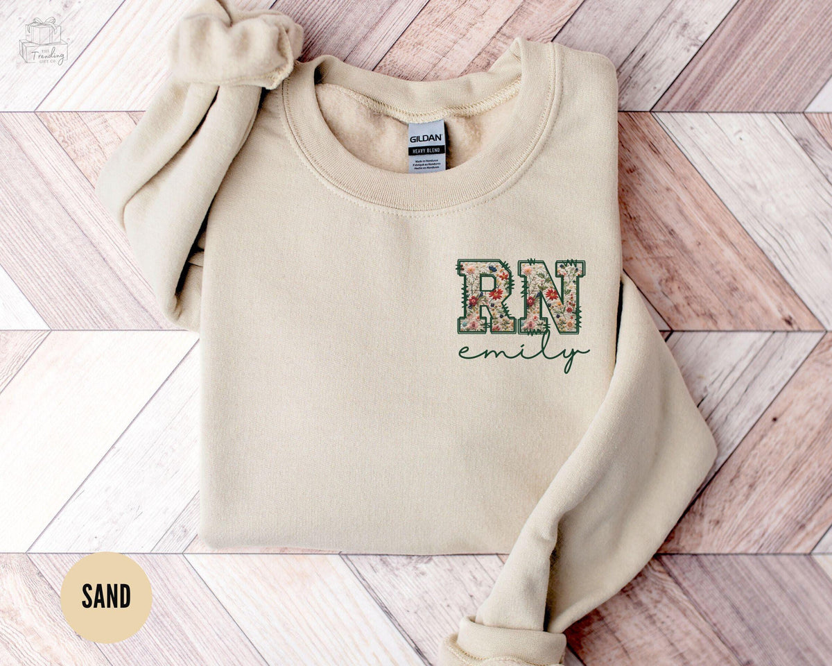 Custom Nurse Sweatshirt RN Sweatshirt Floral Registered Nurse Crewneck Personalized Nurse Name Gift Nurse Grad Gift Sweater Sweatshirt – Fan Favorite · Trending Graphic Apparel