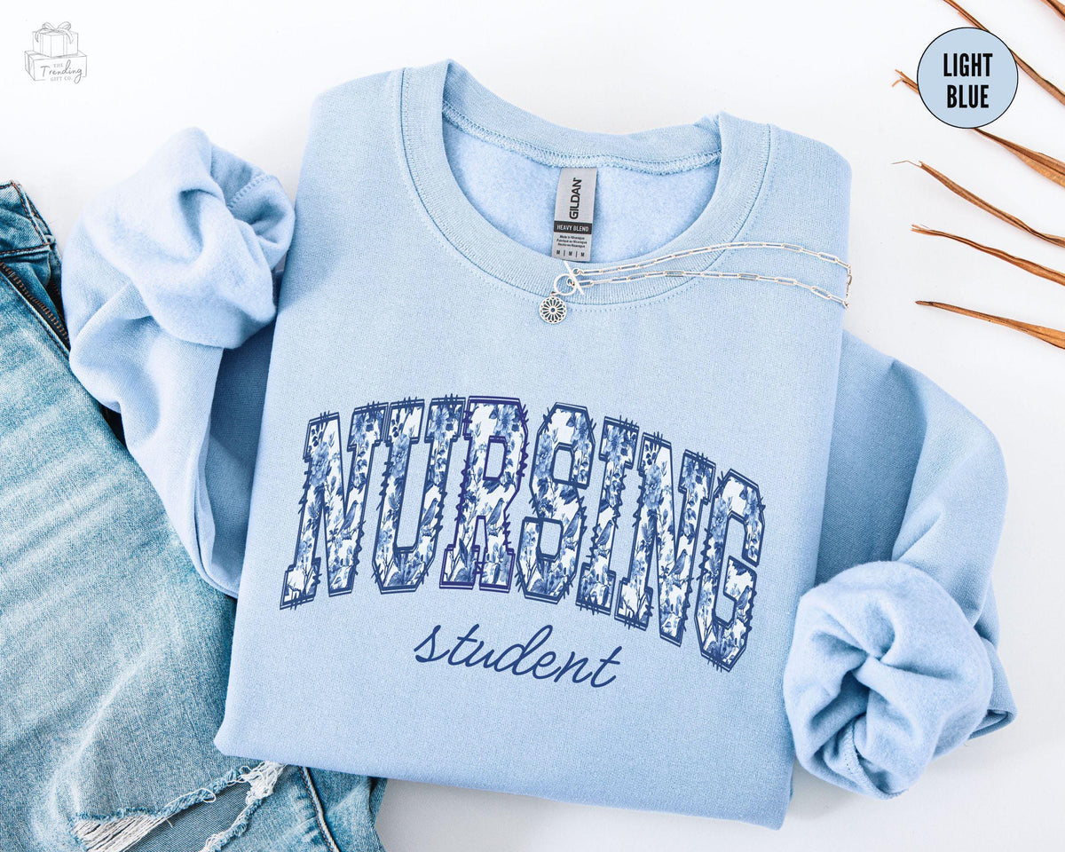 Nursing Student Sweatshirt Floral Nursing School Sweater Rn Crewneck Future Nurse Shirt Chinoiserie Nurse Week Gift CNA Graduation Gift Sweatshirt – Fan Favorite · Perfect For Daily Wear