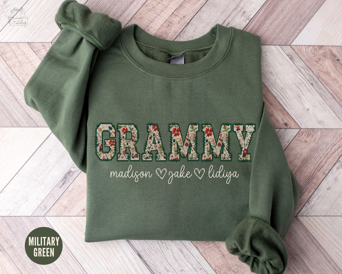 Custom Floral Grammy Sweatshirt with Grandkids Name Personalized Grandma Gift Wildflower Granny Crewneck First Time Grandma Sweater Sweatshirt – Aesthetic Look · Trending Graphic Apparel