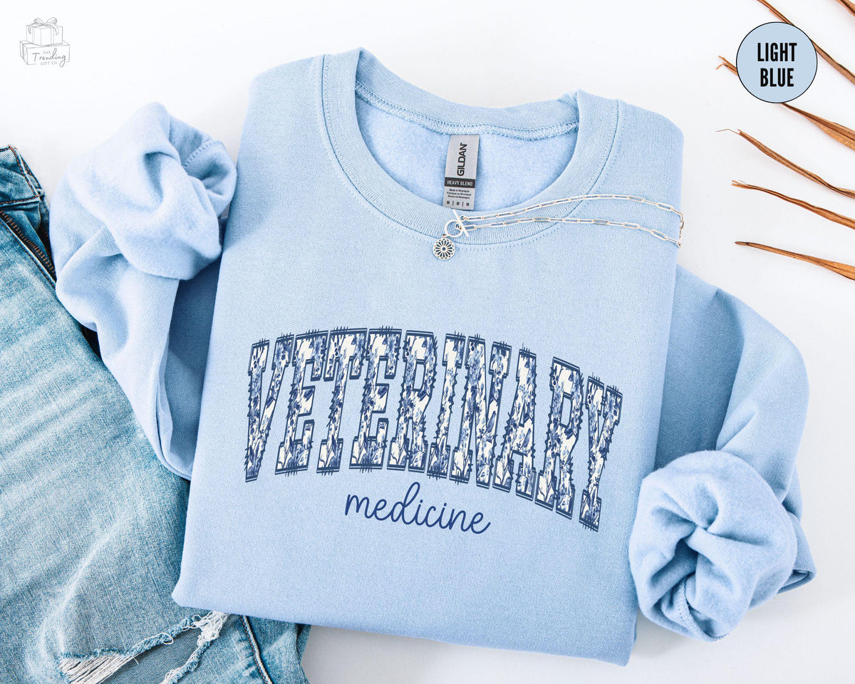 Blue Floral Veterinary Medicine SweatshirtToile Veterinary Sweater Vet Staff ShirtVet Tech Week GiftVet Med Crewneck Veterinarian Shirt Sweatshirt – Aesthetic Look · High-Quality Print