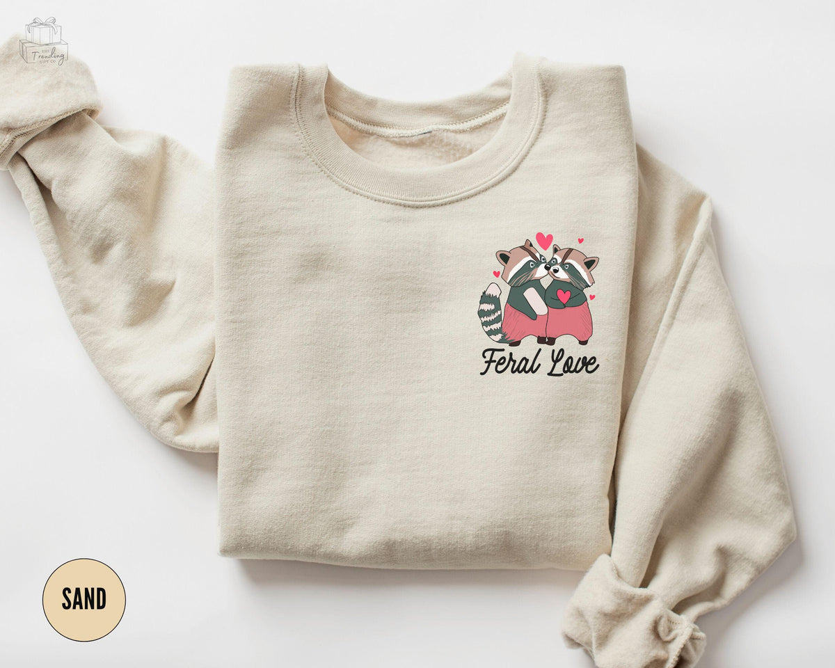 Funny Racoon Sweatshirt Feral Love Valentines Day Heart Shirt Cute Raccoon Lover Gift for Girlfriend Retro Valentines Crewneck Sweatshirt – Cozy Vibes · Perfect For Daily Wear