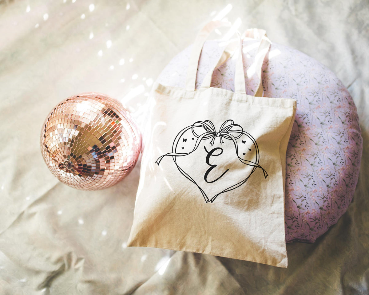 Cute Initial Tote Bag with Heart and Adorable Y2k Aesthetic Doodle Bow Butterfly Lover Minimal Tote with Ribbon Bridal Party Bachelorette Tote Bag – Easygoing Wear · Trending Graphic Apparel