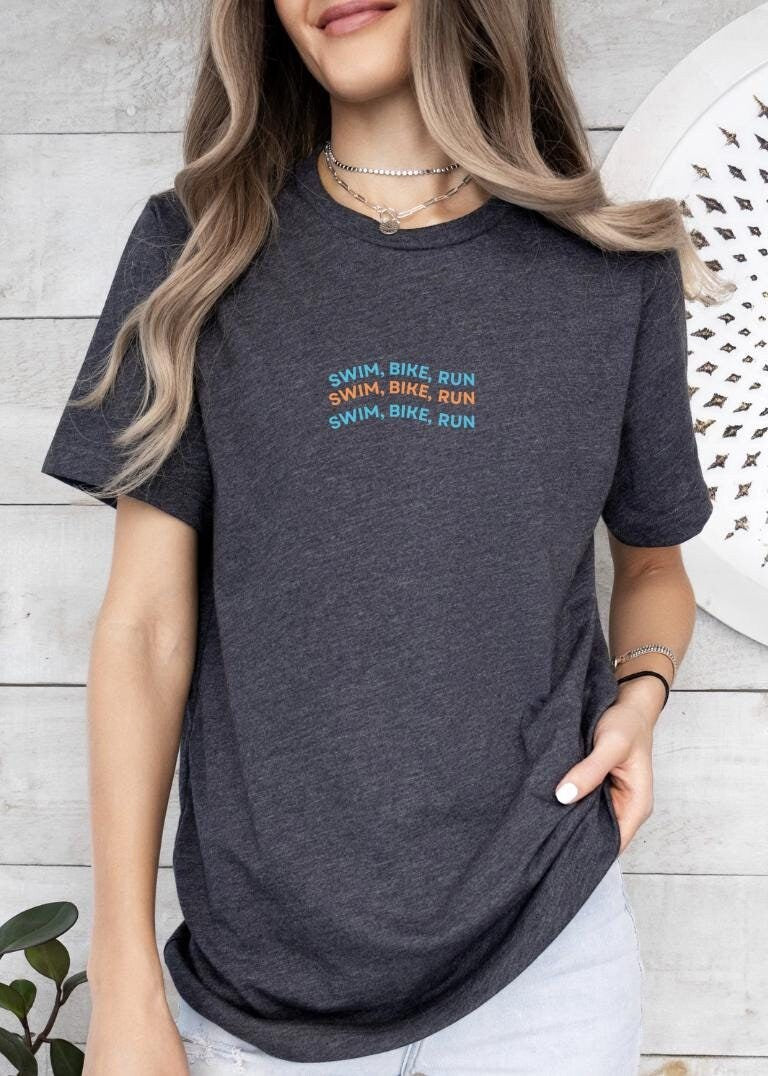 Swim Bike Run Triathlon Tee Triathlon T shirt Triathlete Shirt Triathlete Gift Triathlon Apparel Fitness Motivation Shirt Graphic Tee – Premium Graphic · Perfect For Daily Wear