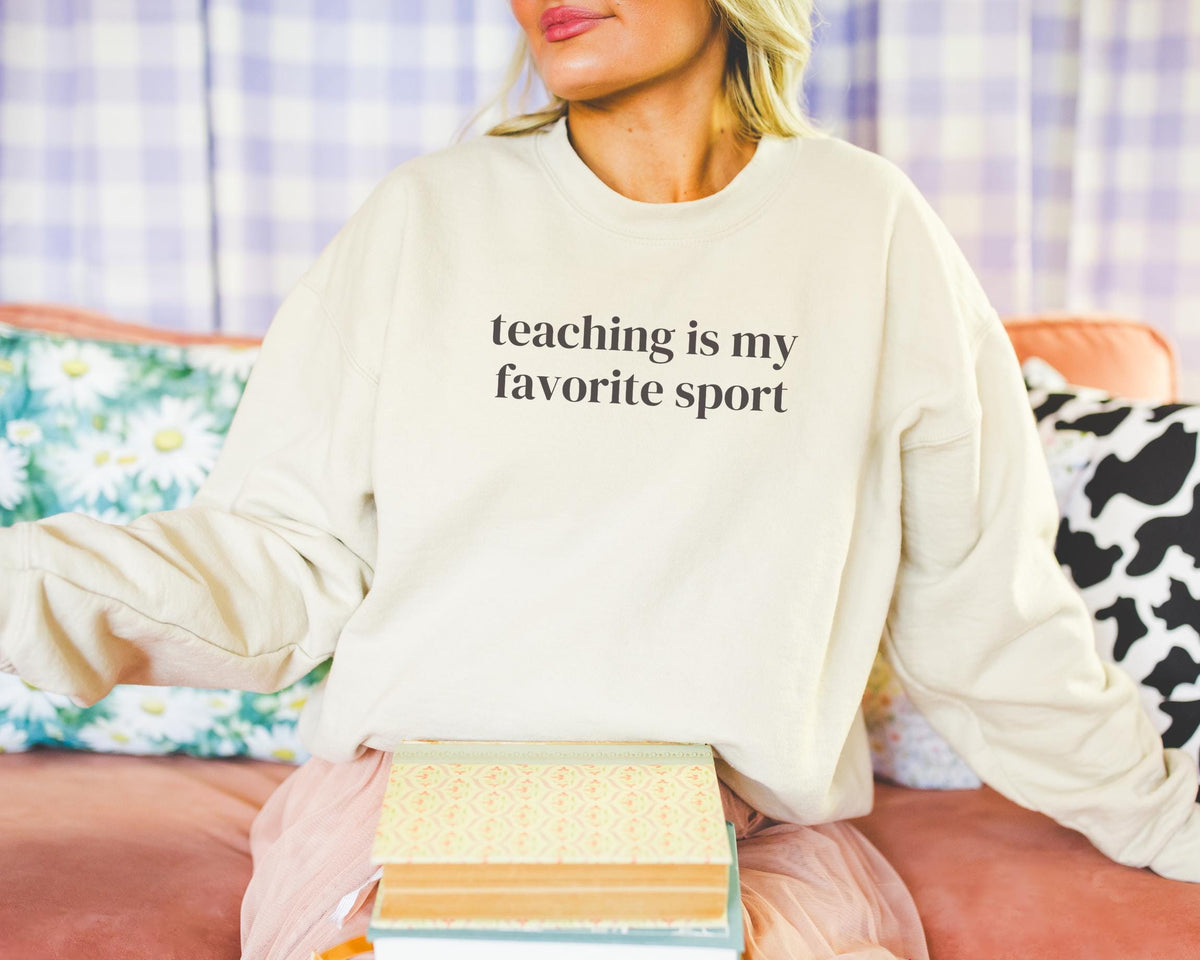 Teaching is My Favorite Sport Funny Saying Sweatshirt Elementary Teacher Junior High School Teacher Simple Minimalist Teaching Gift Sweatshirt – Premium Graphic · Must-Have Style
