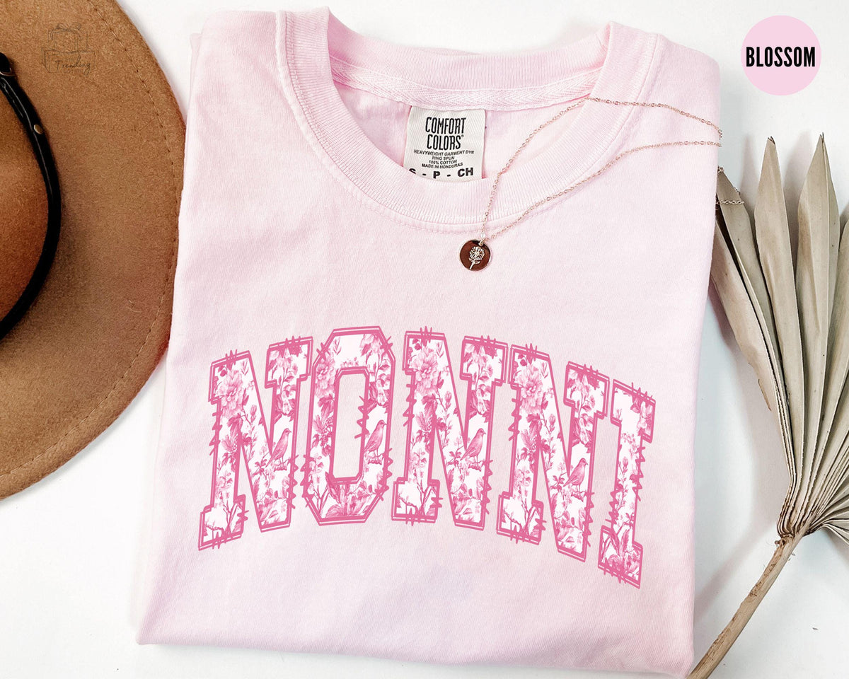 Nonni Shirt Floral Nonni TShirt Mother39s Day Gift For Grandma TShirt Pink Toile Pregnancy Announcement for Grandmother Graphic Tee – Easygoing Wear · High-Quality Print