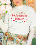 Kindergarten Teacher Tee Shirt with Apples Cute Flowers Retro Groovy Y2K Aesthetic Kindergarten Crew Matching Teacher Back to School Tee Graphic Tee – Fan Favorite · Great Gift For Fans