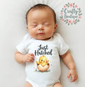 New Baby Outfit Just Hatched Baby Grow Easter Sleep Suit Romper Gift Bib Newborn Set Easter Chic Announcement Newborn Outfit 1129 Graphic Tee – Premium Graphic · Perfect For Daily Wear