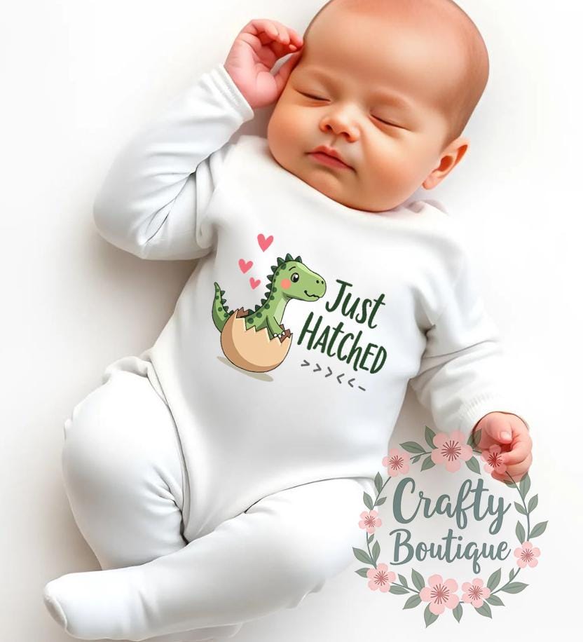 New Baby Outfit Just Hatched Baby Grow Dinosaur Sleep Suit Romper Gift Bib Newborn Set Dino Egg Announcement Newborn Outfit 1128 Graphic Tee – Soft Feel · High-Quality Print