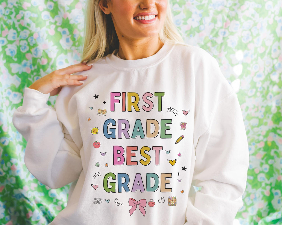 First Grade Teacher Sweatshirt with Cute 90s Aesthetic Doodles Colorful Matching Teacher Crewneck for First Grade Crew New Teacher Present Sweatshirt – Easygoing Wear · Great Gift For Fans