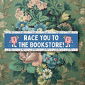 Cute Book Lover Bumper Sticker Race You To The Bookstore Funny Bookish Gift for Reader or Bookworm Gift for New Driver Who Loves Books Graphic Tee – Fan Favorite · Top Pick For Any Outfit
