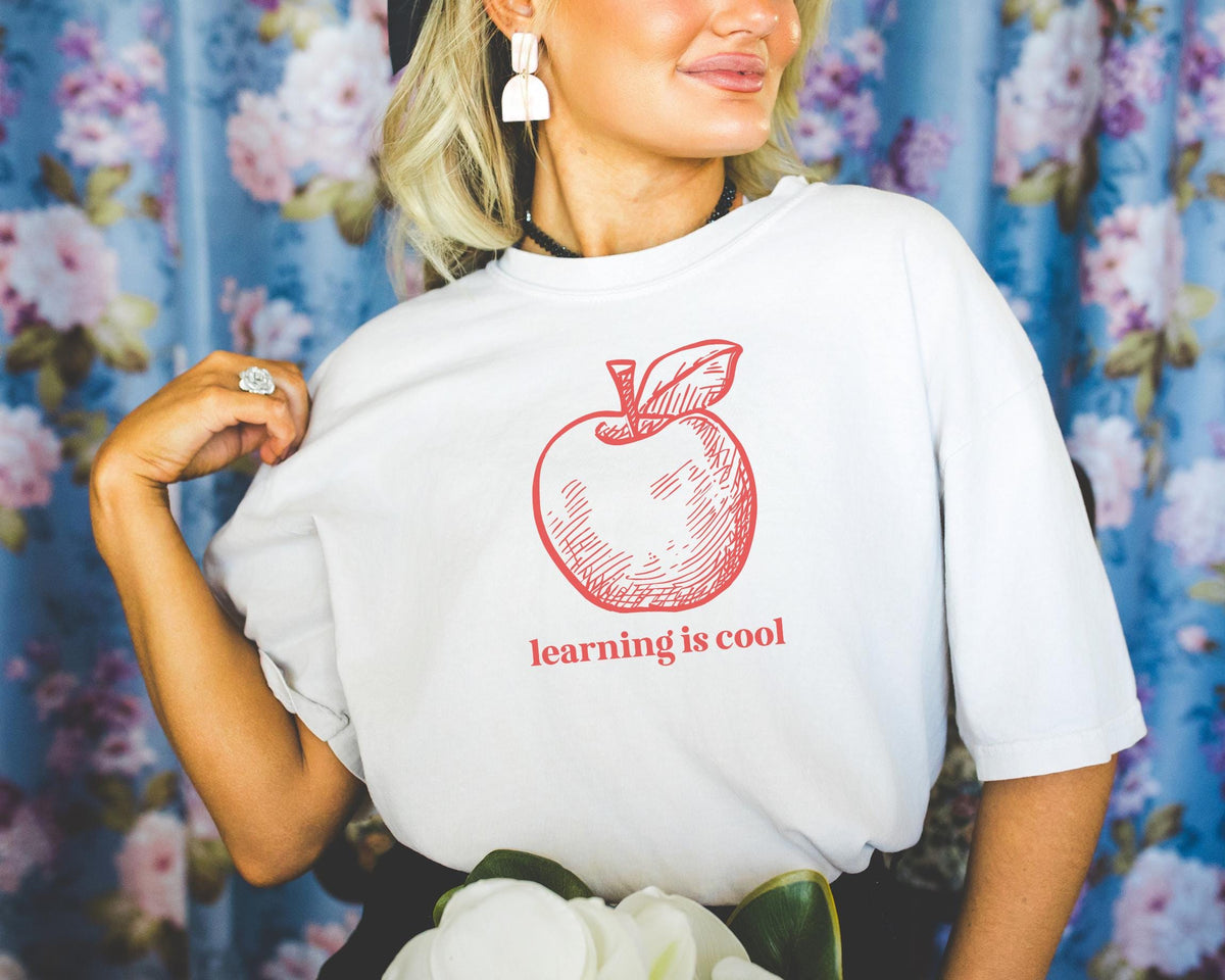 Teacher Appreciation Tee Shirt Learning is Cool Funny Saying TShirt with Cute Apple Kindergarten or High School Teacher Education Major Graphic Tee – Fan Favorite · Great Gift For Fans