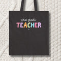First Grade Teacher Tote Bag First Grade Teaching Cute First Day of School Colorful 90s Scrapbook Vibe New Teacher Congratulations Gift Tote Bag – Soft Feel · Top Pick For Any Outfit