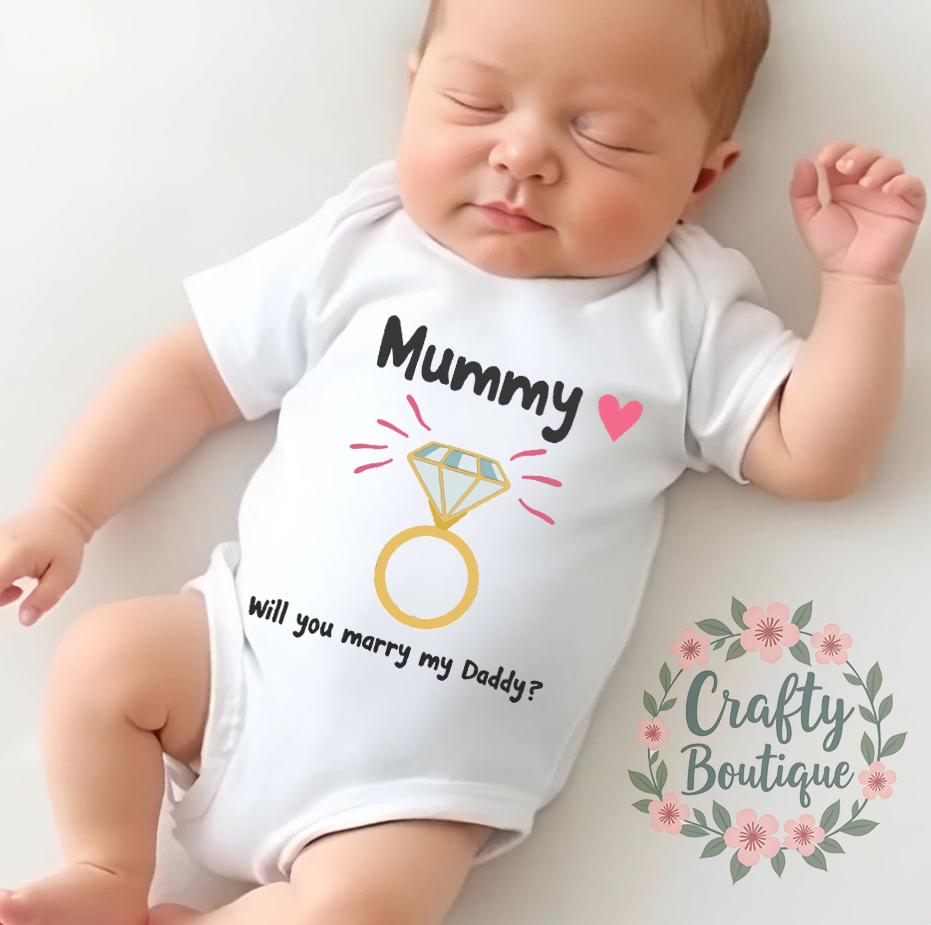 Will You Marry Daddy Marry Me Baby Outfit Vest Baby Grow Engagement Ideas Proposal Baby Suit Marry Daddy Printed Ring Top 1113 Graphic Tee – Warm & Stylish · Top Pick For Any Outfit