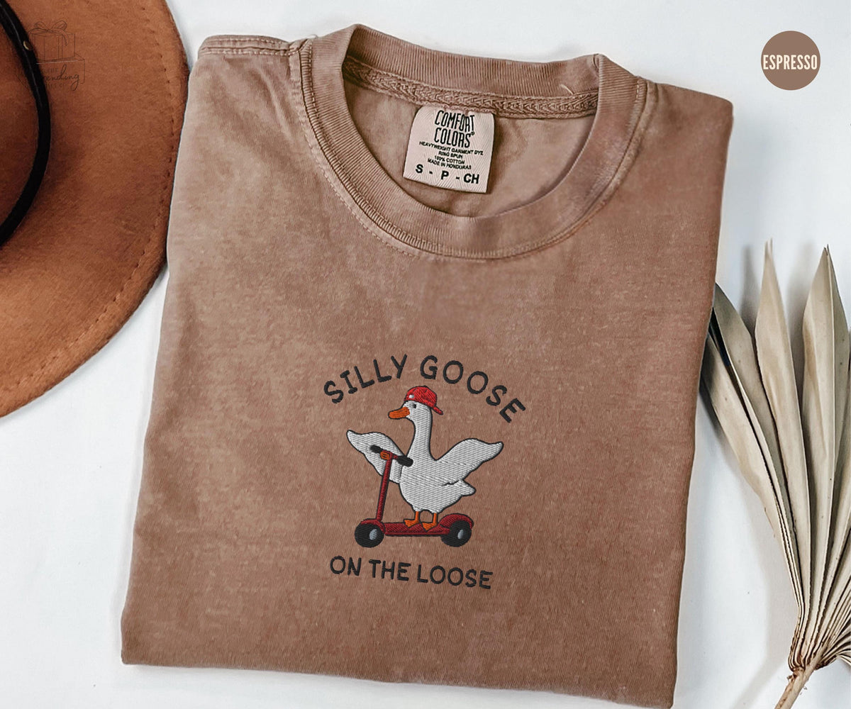 Embroidered Silly Goose Comfort Colors Shirt Funny Goose Lover Gift Humorous Tee Shirts Silly Goose on the Loose Mens Tee Boyfriend Gift Graphic Tee – Premium Graphic · Top Pick For Any Outfit