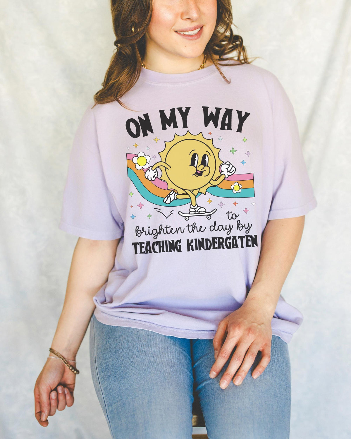 Kindergarten Teacher Tee Shirt with Sun on a Skateboard Funny Kindergarten Crew Tee New Teaching Job Present Elementary Education Major Graphic Tee – Aesthetic Look · High-Quality Print
