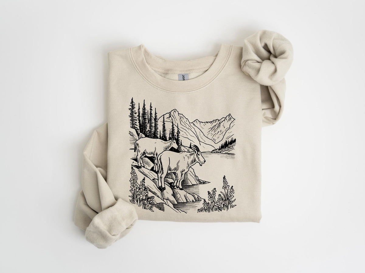 Retro Mountain Goat Wilderness Scene Sweatshirt PNW Vintage Style Animal Sweater Nature Lover Gift Outdoor Apparel Rustic Wildlife Sweatshirt – Feel-Good Design · Trending Graphic Apparel