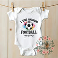 I Love Football With Daddy Funny Newborn Baby Gift Baby Grow Vest Our First Fathers Day Love Dad Tee New Baby Footy Sleepsuit 1200 Graphic Tee – Feel-Good Design · Trending Graphic Apparel