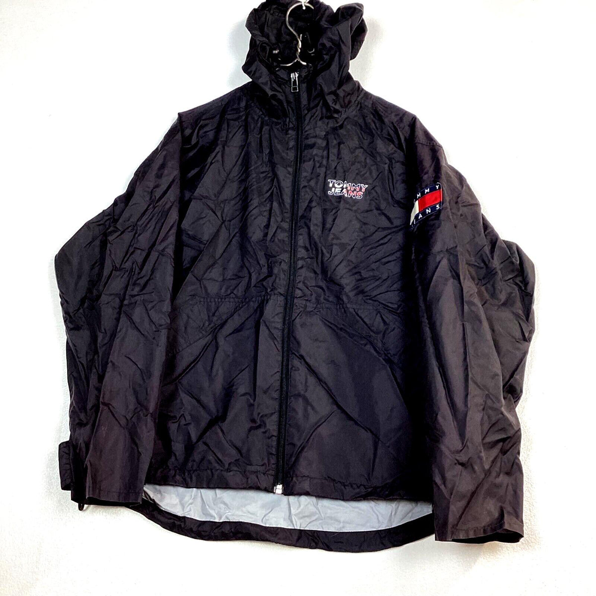 Vintage Tommy Hilfiger Windbreaker Jacket Size Medium Black Hooded Tommy Jeans Graphic Tee – Bold Style · High-Quality Print