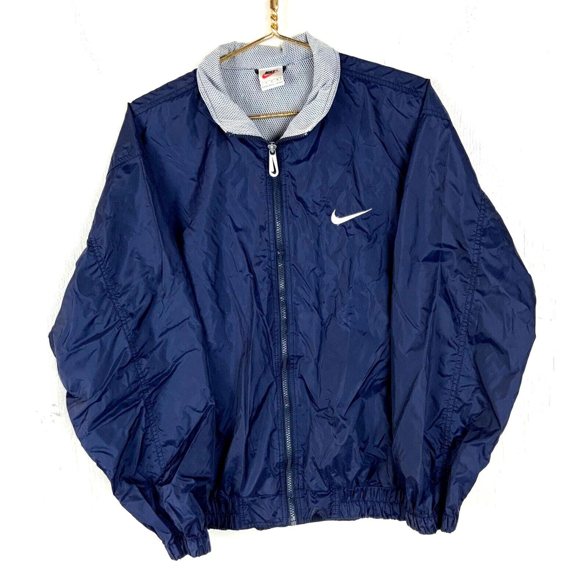 Vintage Nike Windbreaker Jacket Medium Blue Full Zip Lined 90s Graphic Tee – Cozy Vibes · Trending Graphic Apparel