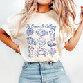 The Ocean is Calling Summer Shirt Seashells Shirt Shells Shirt Summer Vibes Trendy Tee Girly Summer Beach Shirt Beachy Tee Graphic Tee – Cozy Vibes · Trending Graphic Apparel