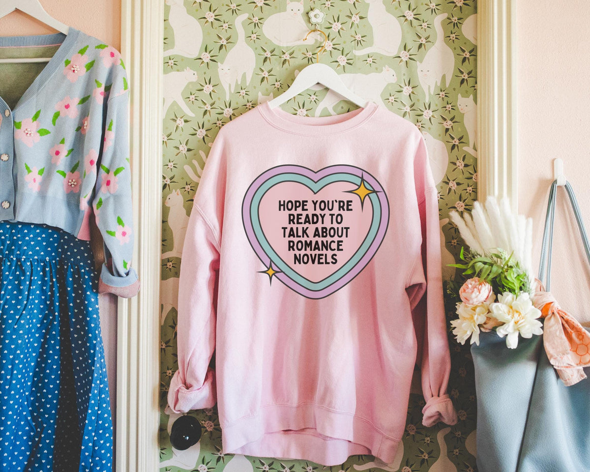 Romance Reader Sweatshirt Bookworm Who Loves Romance Novels Funny Saying Book Lover Gift Idea Matching Romance Book Shirt for Readers Sweatshirt – Bold Style · Trending Graphic Apparel