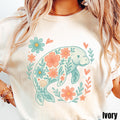 Floral Manatee Summer Shirt Preppy Summer Beach Lover Shirt Coastal Aesthetic Floral Tee Ocean Lover Gift Beach Vacation Graphic Tee – Aesthetic Look · High-Quality Print
