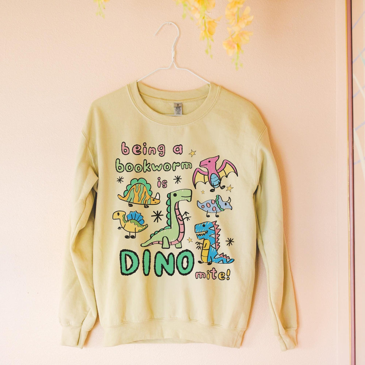 Cute Bookworm Sweatshirt Adorable Doodle Dinosaurs Funny Saying Librarian Gift Reading Teacher School Librarian Tee Romance Reader Gift Sweatshirt – Cozy Vibes · Trending Graphic Apparel