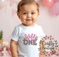 Wild One Tshirt 1st Birthday Cake Smash Girls Baby Grow Personalised Vest Gift Daughter Outfit First Birthday Top Jungle Theme 1236 Graphic Tee – Feel-Good Design · Trending Graphic Apparel