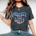 Protect The Dolls Feminist Empowerment Trans Rights Pride LGBTQ Support Retro Gradient Style Graphic Tee – Bold Style · Must-Have Style