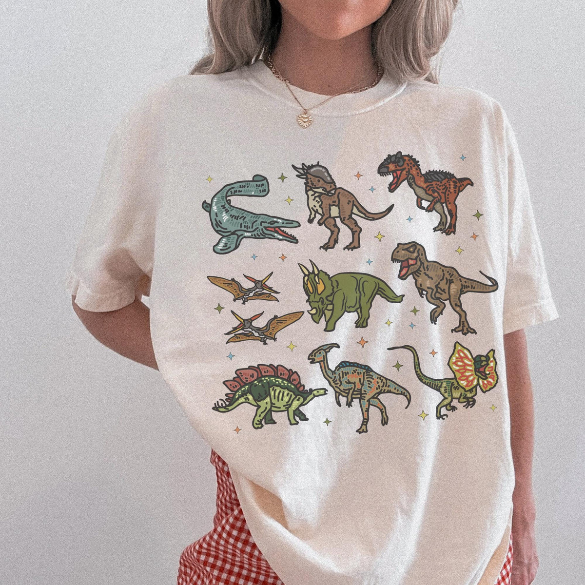 Doodle Dinosaur Tee Shirt with Stars in Comfort Colors Shirt for Dinosaur Lovers of All Ages with Cute Retro Aesthetic Stars 90s Vibe Graphic Tee – Bold Style · Trending Graphic Apparel