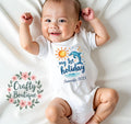 My First Holiday Baby Grow 1st Holiday Baby Vest Personalised Baby Gift Kids 1st Holiday Tshirt Summer Outfit Baby Boy Gift 1316 Graphic Tee – Warm & Stylish · Must-Have Style