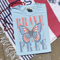Free and Brave Shirt July 4th TShirt Usa Patriotic Tee 4th of July Party TShirt Trendy Usa Celebration Shirt Graphic Tee – Feel-Good Design · Trending Graphic Apparel