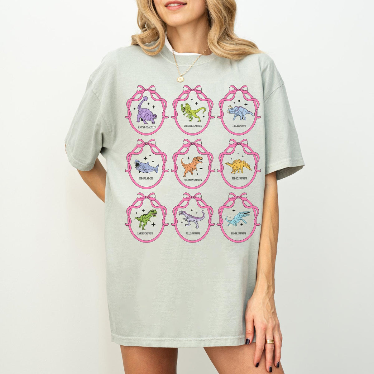Dinosaur Lover Tee Shirt with Cute Coquette Ribbons and Retro Aesthetic Stars Cute Birthday Gift Cozy Animal Lover Paleontologist Tee Graphic Tee – Soft Feel · Top Pick For Any Outfit